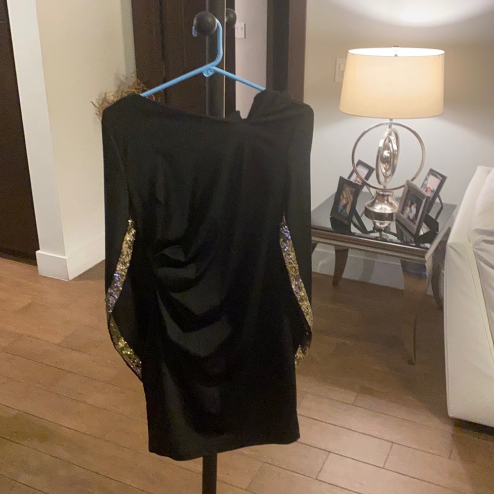 The brand is from chick me it's a very nice black dress